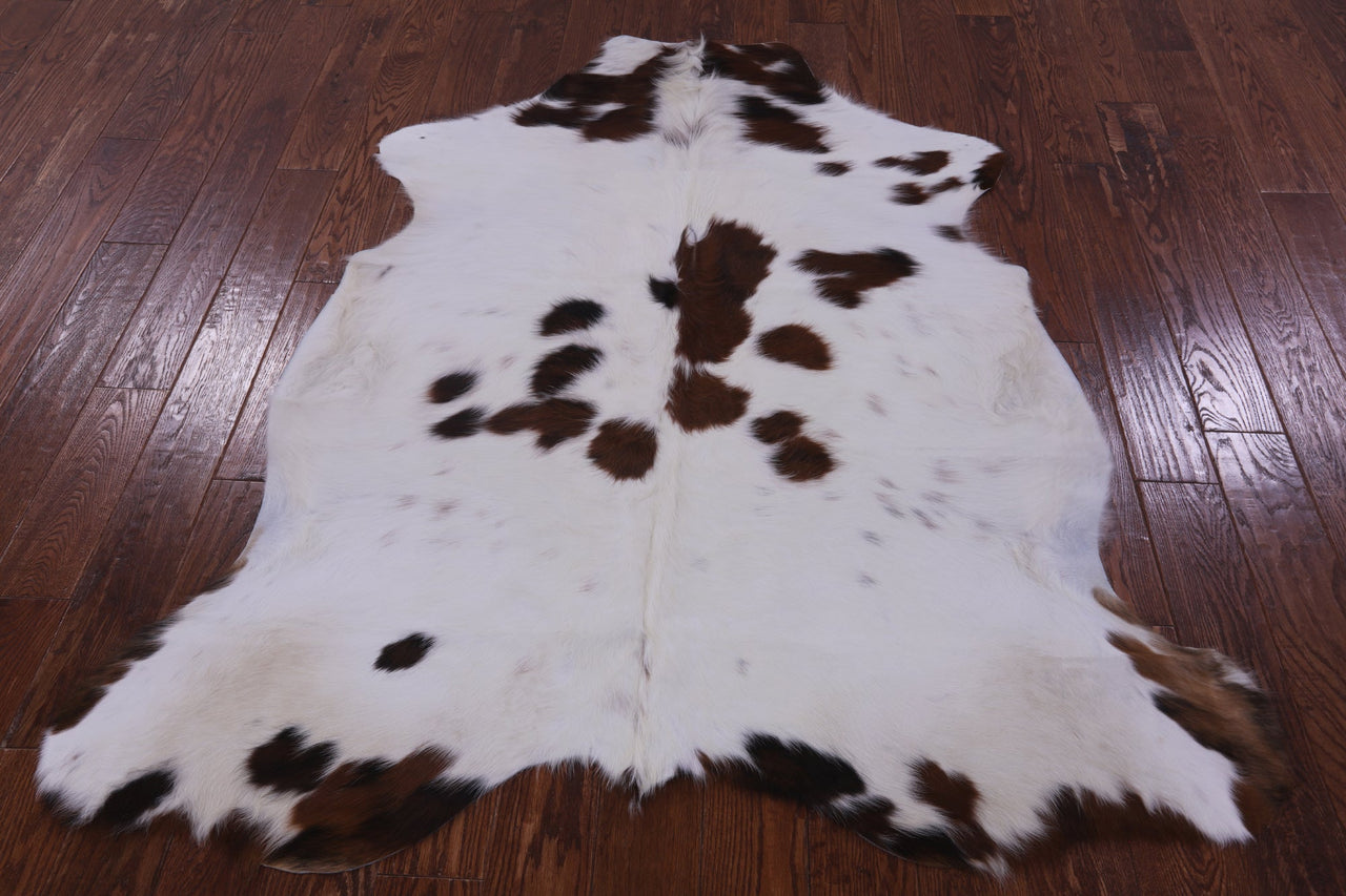 Brown & White Natural Cowhide Rug - Small 5'11"H x 5'3"W