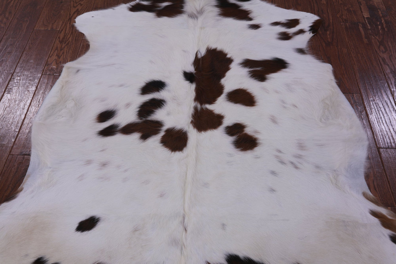 Brown & White Natural Cowhide Rug - Small 5'11"H x 5'3"W