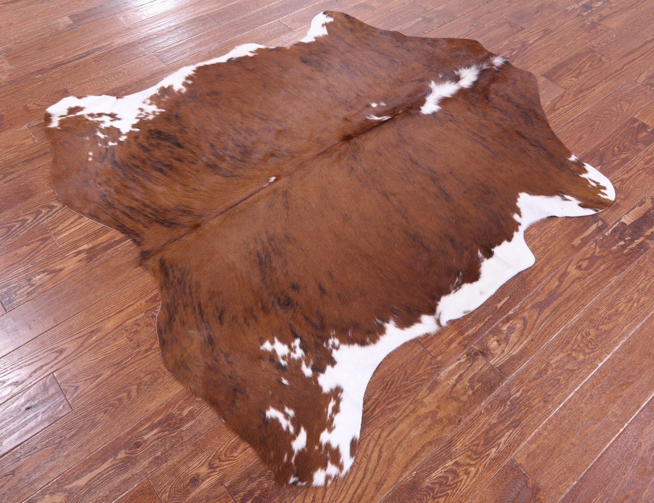 Brown & White Natural Cowhide Rug - Small 5'10"H x 5'9"W